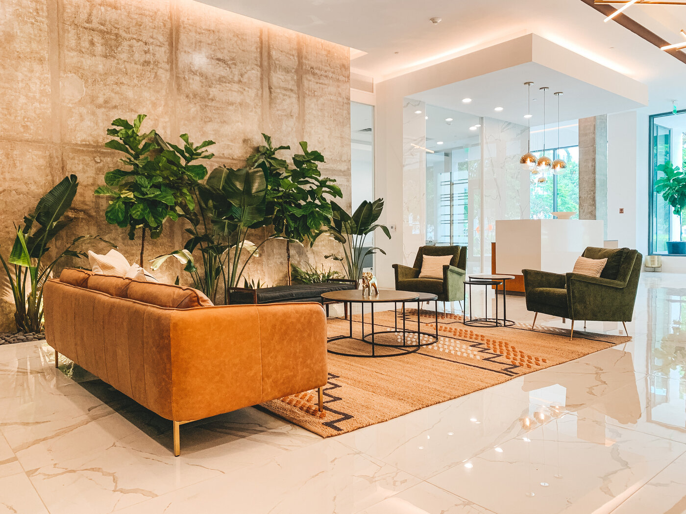 Lobby seating area with leather sofa and designer furniture